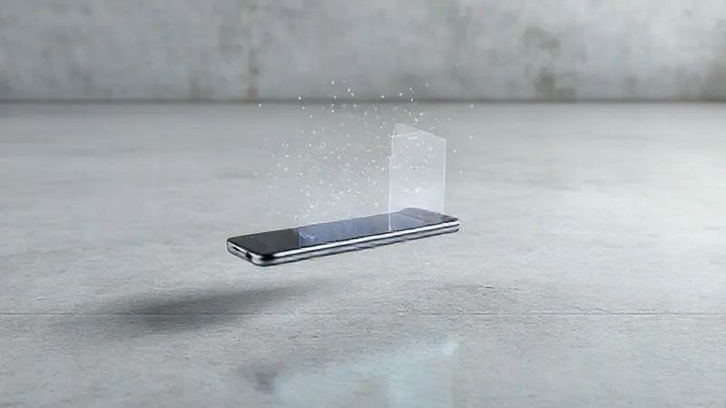 Ilustração conceitual de celular caindo, protegido por uma aura que simboliza a absorção de impacto da capinha.